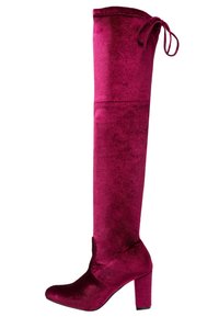 Fuchsiové, nad kotníky, sametové boty s tlustým blokovým podpatkem a kulatou špičkou. Obsahují zavazování v horní části a hladký povrch.