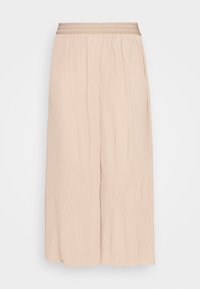 Ljus beige vida byxor i texturerat tyg, med en samlad elastisk midja och en vävd detalj.