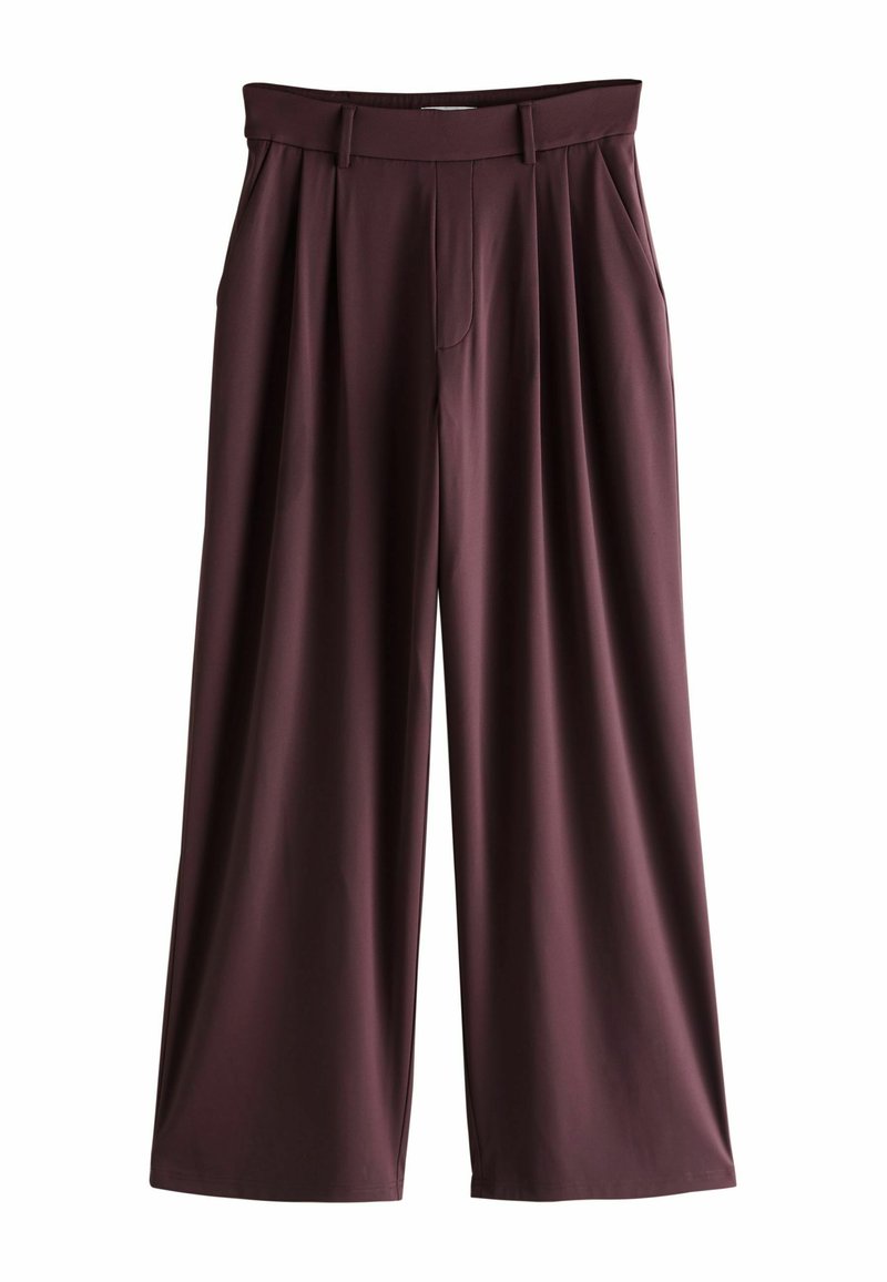 Bourgognevide bukser med vide ben, plisseret front, elastisk linning og glat, let stof. Har dybe sidelommer.