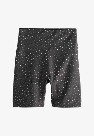 Zwarte biker shorts met hoge taille, kleine witte polkadots en plat gestikte naden.