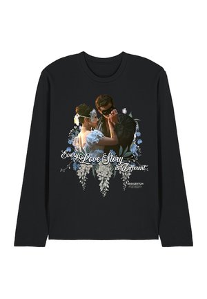 Couple in vintage attire wearing masks faces close, surrounded by flowers with text "Every Love Story is Different" on black long-sleeve shirt.