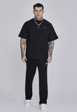 ESSENTIALS  - Püksid - black