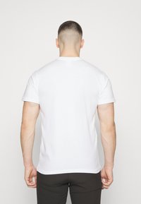 Helly Hansen HH BOX - Triko s potiskem - white