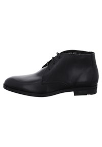 Schwarze Leder-Ankle-Boots mit glatter Oberfläche, runder Zehenpartie, Schnürung und niedrigem Absatz. Mit dezenten Steppnähten.