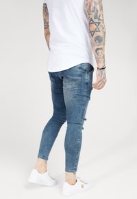 SIKSILK DISTRESSED SUPER  - Jeans Skinny Fit - light blue