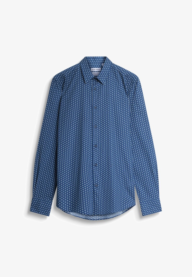 Camicia azzurra con bottoni, motivo circolare bianco su fondo, maniche lunghe e colletto classico. Realizzata in tessuto leggero con una texture liscia.