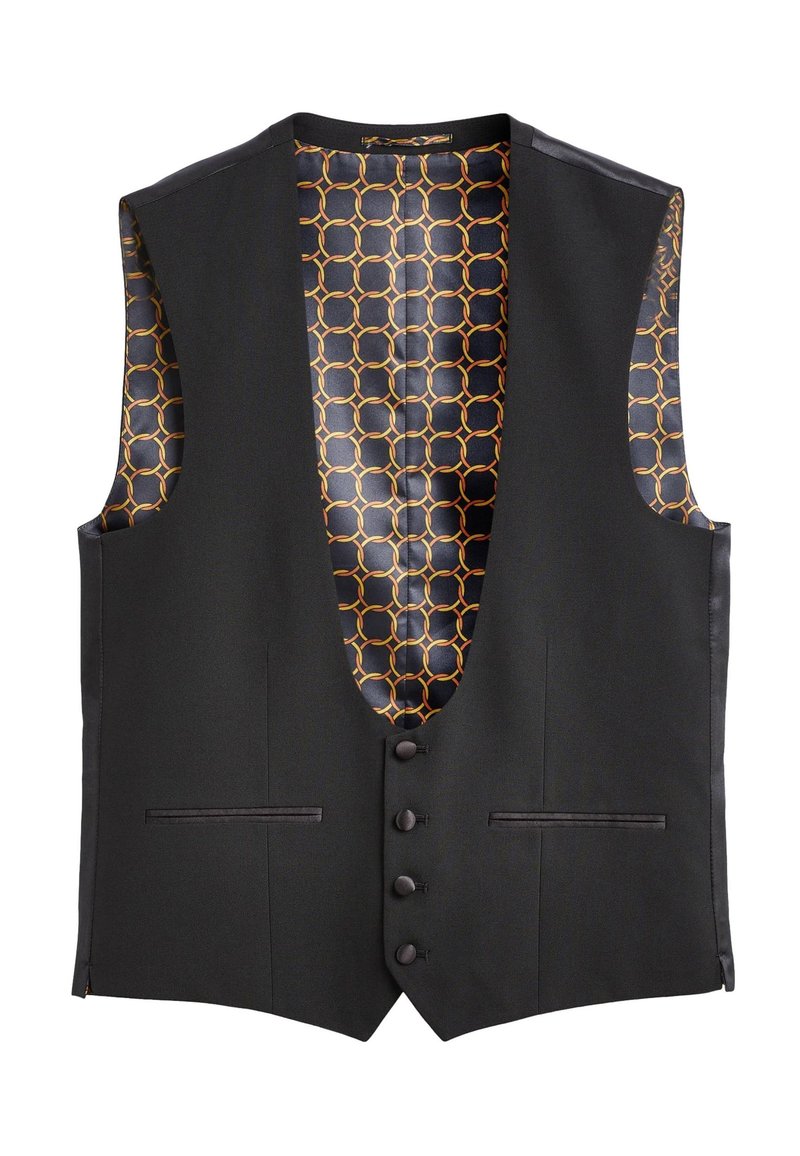 Chaleco negro con un escote en V profundo y sin mangas. El interior presenta un patrón geométrico en amarillo y negro. Incluye cinco botones y bolsillos laterales.