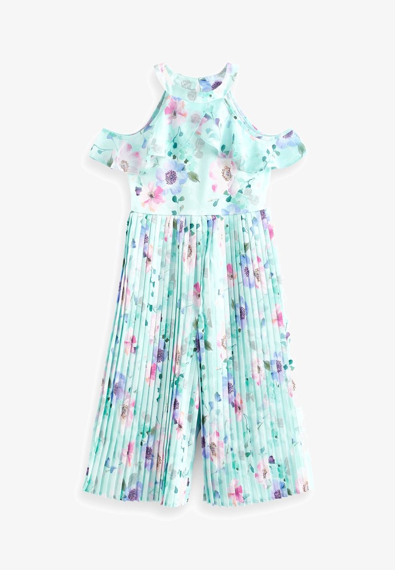 Combinaison fleurie vert menthe, présentant un design épaules dénudées, des jambes plissées, et un motif de fleurs roses et violettes avec des feuilles vertes.