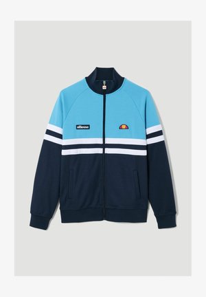 Chaqueta con cremallera en azul claro y marino, con rayas blancas y negras. Fabricada en material suave, con dos bolsillos laterales y parche de logo.