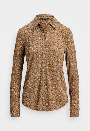 Brun skjorte med knaplukning i et geometrisk mønster i creme og orange. Har en standard krave og lange ærmer. Glat stofstruktur.