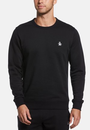 Zwarte sweatshirts met ronde hals gemaakt van katoen, met geribbelde manchetten en zoom. Klein wit pinguïnlogo op de linkerkant van de borst. Zachte textuur.