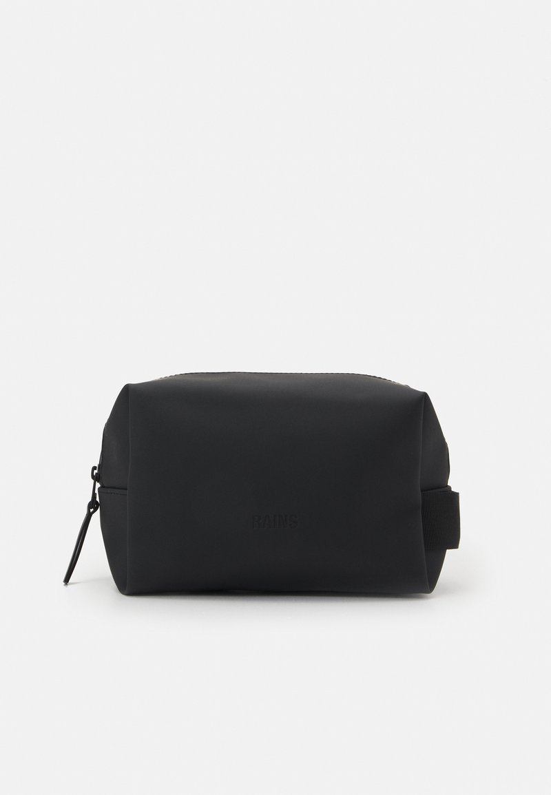 Black toiletry bag made of waterproof material, featuring a cylindrical shape, a zipper closure, and a side strap for easy carrying.