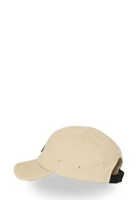 Cappello in corduroy beige con visiera curvata, cinturino regolabile nero sul retro e due fori di ventilazione su ciascun lato.