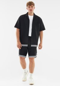 Johnny Urban PARKER - Pantaloni de trening - black