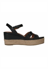 Zwarte leren wedge sandaal met kruisbandjes, verstelbare enkelband en jute-wikkelzool. Gladde textuur, minimalistisch ontwerp.