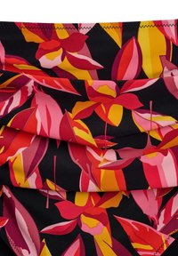Floral fabric featuring large, vibrant pink, red, and yellow leaves against a black background, with a smooth texture and subtle pleats.