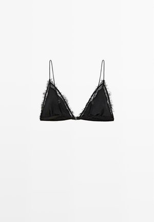 Soutien-gorge triangle noir avec des bretelles fines, présentant une garniture à franges le long des bords et de petits accents en métal sur les bonnets.