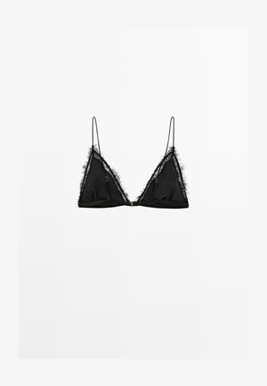 Soutien-gorge triangle noir avec des bretelles fines, présentant une garniture à franges le long des bords et de petits accents en métal sur les bonnets.