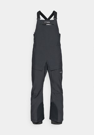 Salopettes noires isolées en matériau imperméable, dotées de bretelles réglables, d'une poche zippée à l'avant et de zones de genoux renforcées.