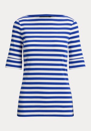 Sinivalkoraidallinen lyhythihainen paita, jossa venepääntie. Valmistettu pehmeästä kankaasta, jossa vaakasuorat, yhtä leveät raidat.