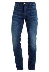 Jeans av denim i mörkblå nyans med slim fit, som har fem fickor, mässingsknapp och subtila blekningar och slitningsdetaljer.