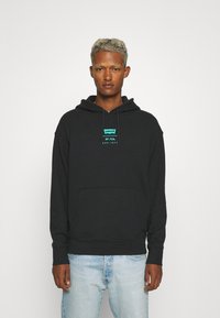 Levi's® RELAXED GRAPHIC - Sweatshirt com capuz - black