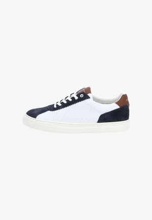 White and navy suede sneakers with a rubber sole, featuring a brown leather accent at the heel and white laces. Smooth and textured surfaces.