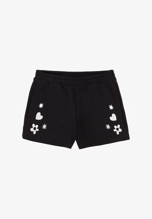 Fekete sportnadrág elasztikus derékkal, bal oldalon fehér hímzett virágokkal, szívvel és csillagokkal.