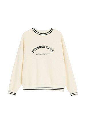 Kremowa bluza z czarnym paskowanym kołnierzem, mankietami i wykończeniem u dołu, z napisem "DIVERSE CLUB ESTABLISHED 1993" na przodzie.