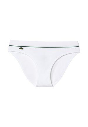 Culottes en coton blanc avec une texture côtelée, une taille rayée verte et un petit logo brodé sur le côté gauche à l'avant.