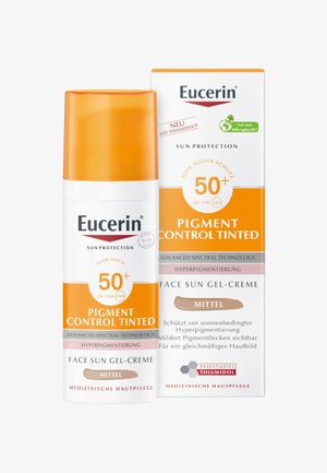 Eucerin getönte Sonnen-Gel-Creme mit SPF 50+, weißer Behälter, orangefarbener Deckel, mit Produktdetails in roten und braunen Schriftzügen auf der Verpackung.