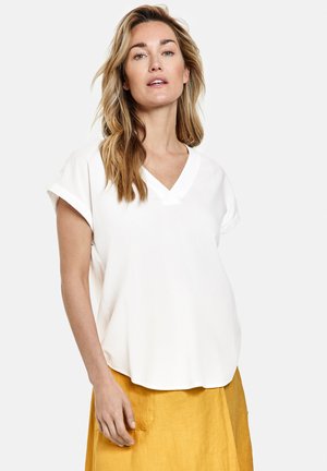 OHNE ARM AUS - Blouse - off white