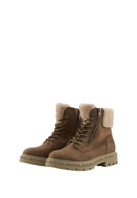 Bottines marron en daim, dotées d'un col en fausse fourrure, d'une fermeture à glissière sur le côté et d'une semelle en caoutchouc texturée avec un design épais.