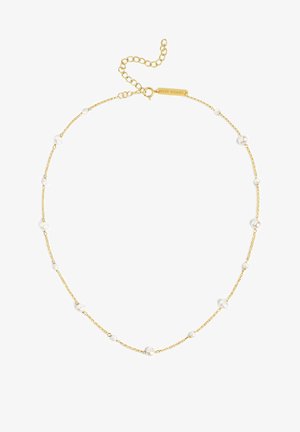 Collier en chaîne dorée comprenant des perles blanches disposées de manière irrégulière, avec un design délicat et un fermoir ajustable sécurisé.