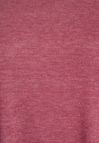 Close-up of soft, heathered rose pink fabric with fine knit texture and subtle color variations.