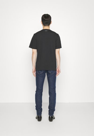 Roberto Cavalli SKIN JAGUA SIDE - Testhezálló fazon - medium blue denim