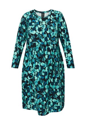 Vestido en teal y negro con un patrón circular, con mangas largas y escote redondo, hecho de una tela suave y con un corte holgado.