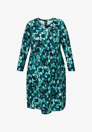 Vestido en teal y negro con un patrón circular, con mangas largas y escote redondo, hecho de una tela suave y con un corte holgado.