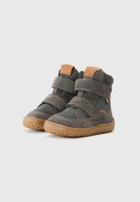 Grey high-top shoes with velcro straps, featuring suede and mesh materials, rubber soles, and a brown leather accent at the heel.