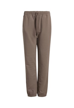 Brune sweatpants med elastisk talje og justerbar snor. Har tætsiddende cuffs og sidelommer. Fremstillet af blødt stof.