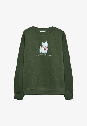Felpa verde scuro con maniche lunghe, decorata con un cane bianco ricamato con una sciarpa rossa e del testo sottostante. Design in un tessuto morbido e informale.