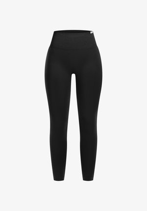 Leggings noirs avec une taille haute. Fabriqués à partir d'un tissu lisse et extensible, présentant un design ajusté et une construction sans coutures.