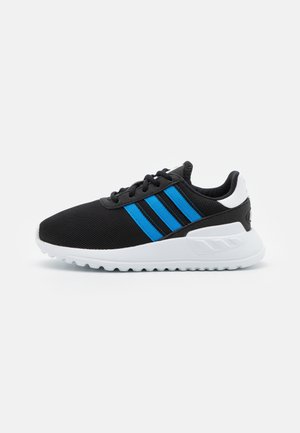 TRAINER LITE UNISEX - Sneakers - core black/blue rush/footwear white