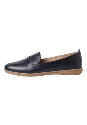 Sort læder slip-on loafer med tan gummisål, lav hæl og rundet tå, vist fra siden på hvid baggrund.