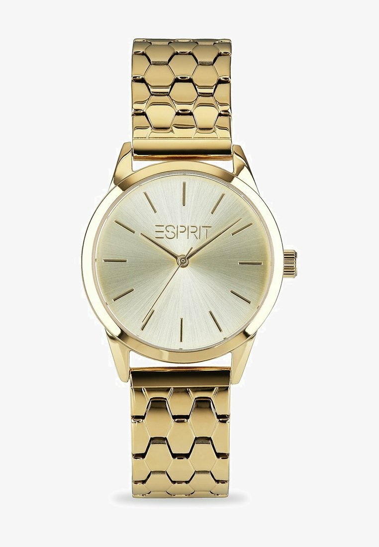 Guldfärgad klocka med ett texturerat hexagonalt armband och en borstad guldskiva. Har minimalistiska timmarkeringar och varumärket "ESPRIT."