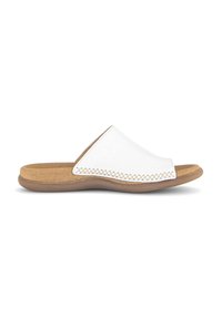 White slide sandals with a smooth leather upper and stitched accent. Features a cork footbed and flexible brown rubber outsole.