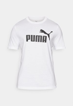 Balta medvilninė marškinėliai su dideliu juodu „PUMA“ logotipu ir juodu šokiu katinu grafika kairėje pusėje. Trumpi rankoviai, apvalus kaklo dizainas.