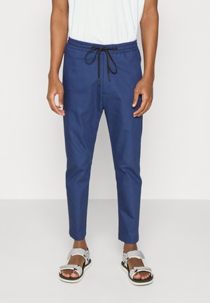 JEGER - Tracksuit bottoms - blue