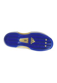 Sola della scarpa con una superficie in gomma prevalentemente blu, caratterizzata da un motivo a spina di pesce, dettagli in oro e un bordo bianco.