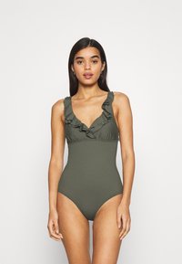 Fato de banho de uma peça em verde oliva com decote e alças de ombro rendadas, textura suave, design ajustado e pernas de corte alto.